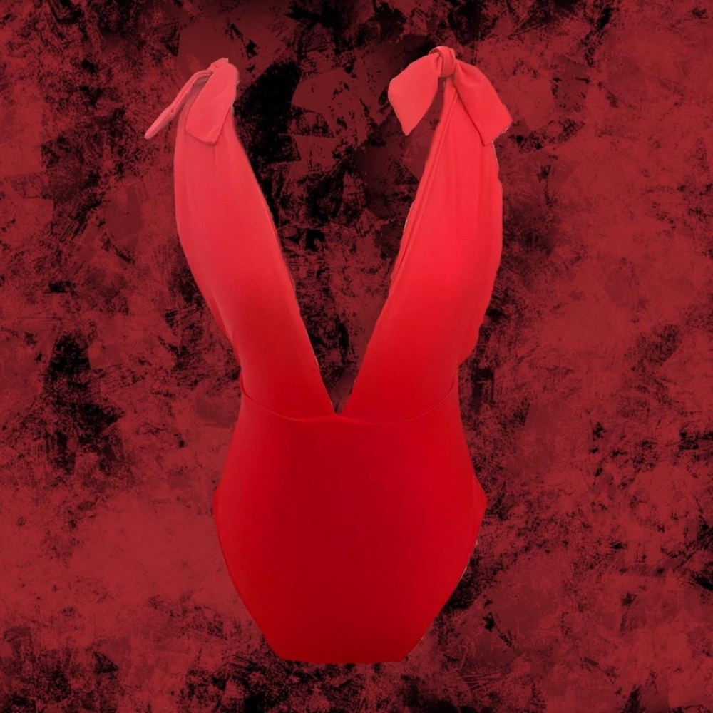 red one piece swimsuit with ties on shoulders